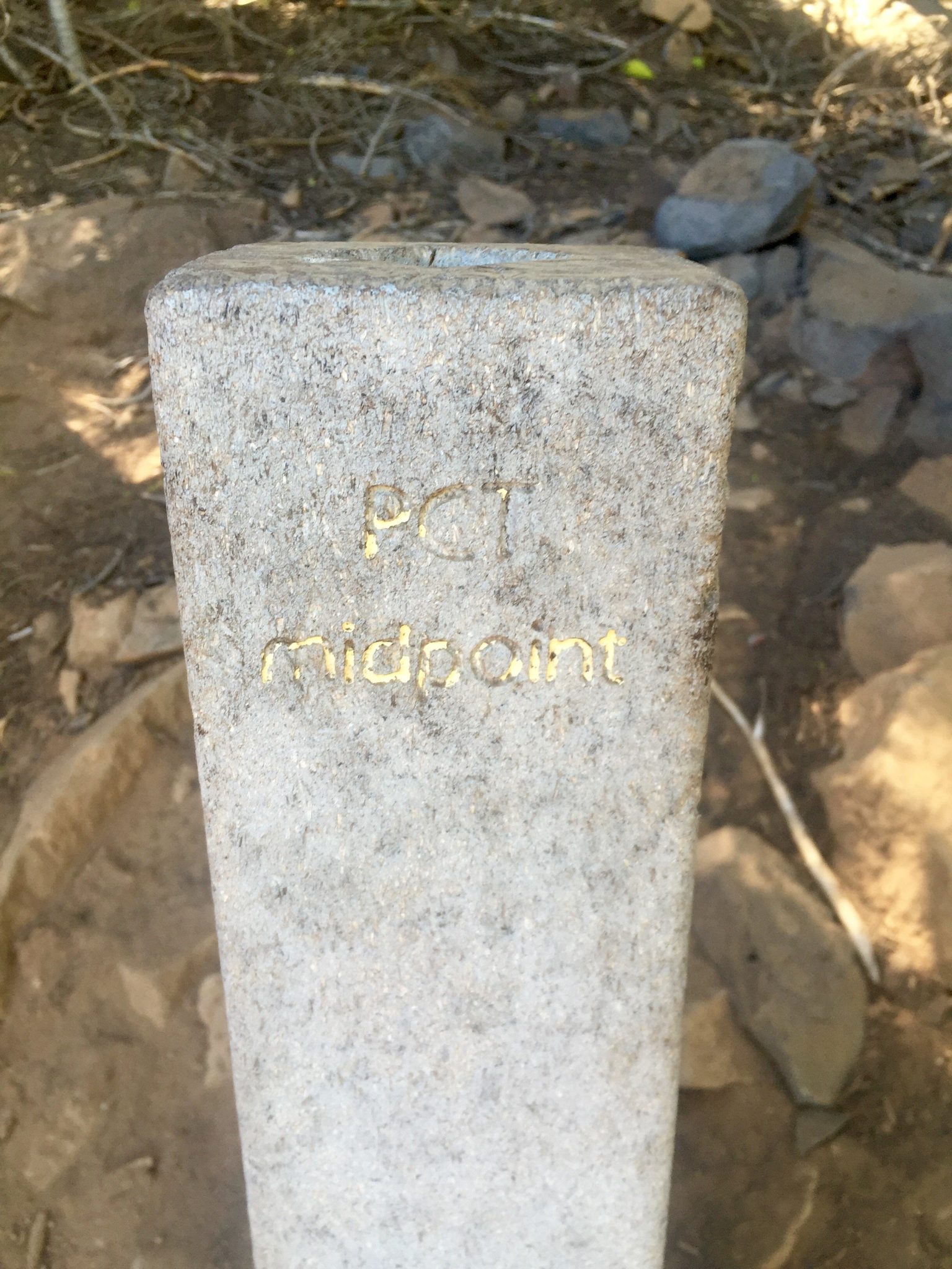 Stone post marking the PCT halfway point
