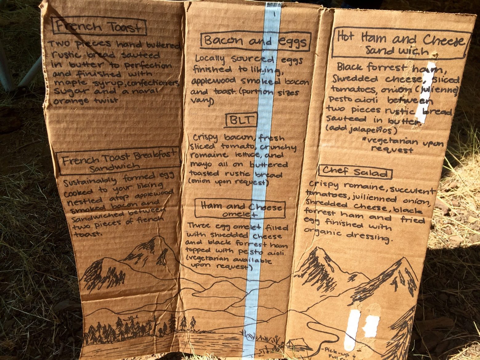 Cardboard handwritten menu at Le Bistro trail magic