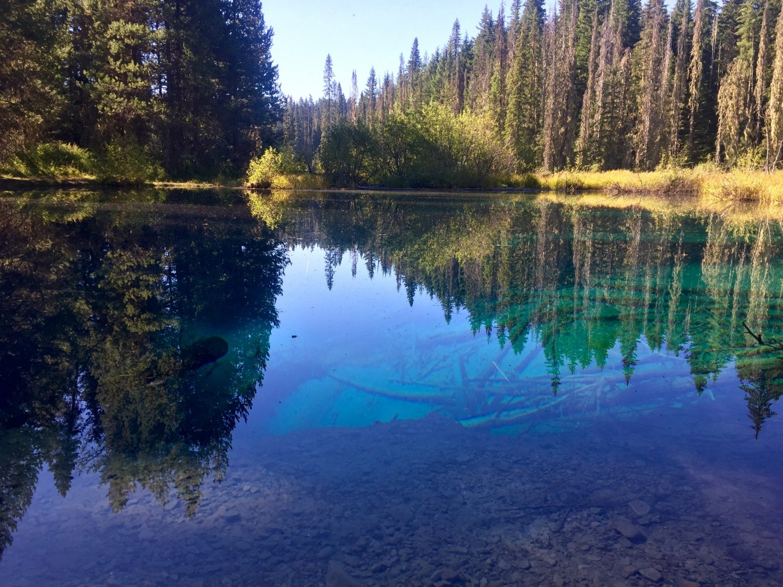 Deep blue and green water of Little Crater Lake