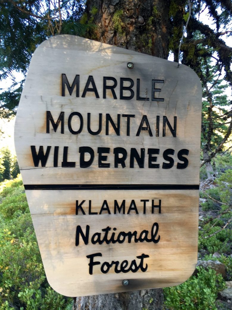 Sign marking boundary of Marble Mountain Wilderness Area