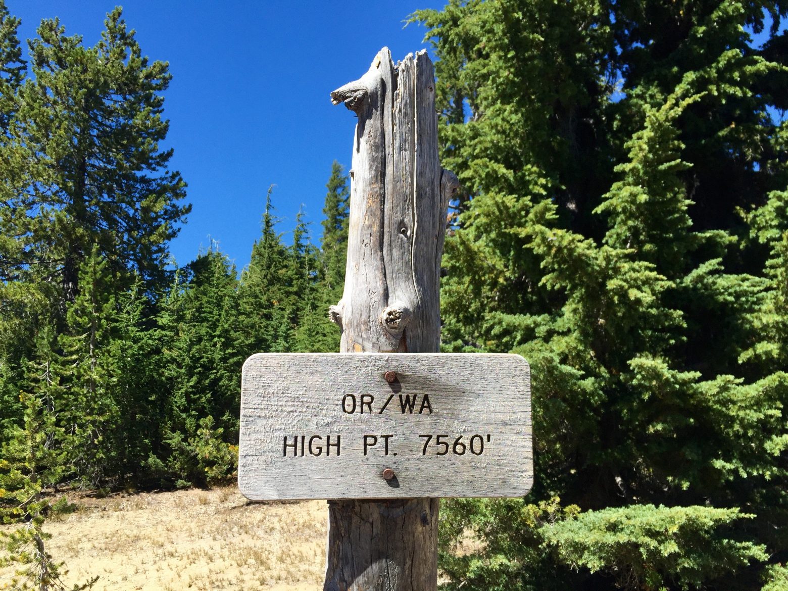 Sign marking the high point of the trail in Oregon and Washington