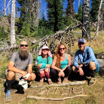 Beardoh Sweet Pea Gazelle and Mountain Man posing at the PCT 2000 mile marker