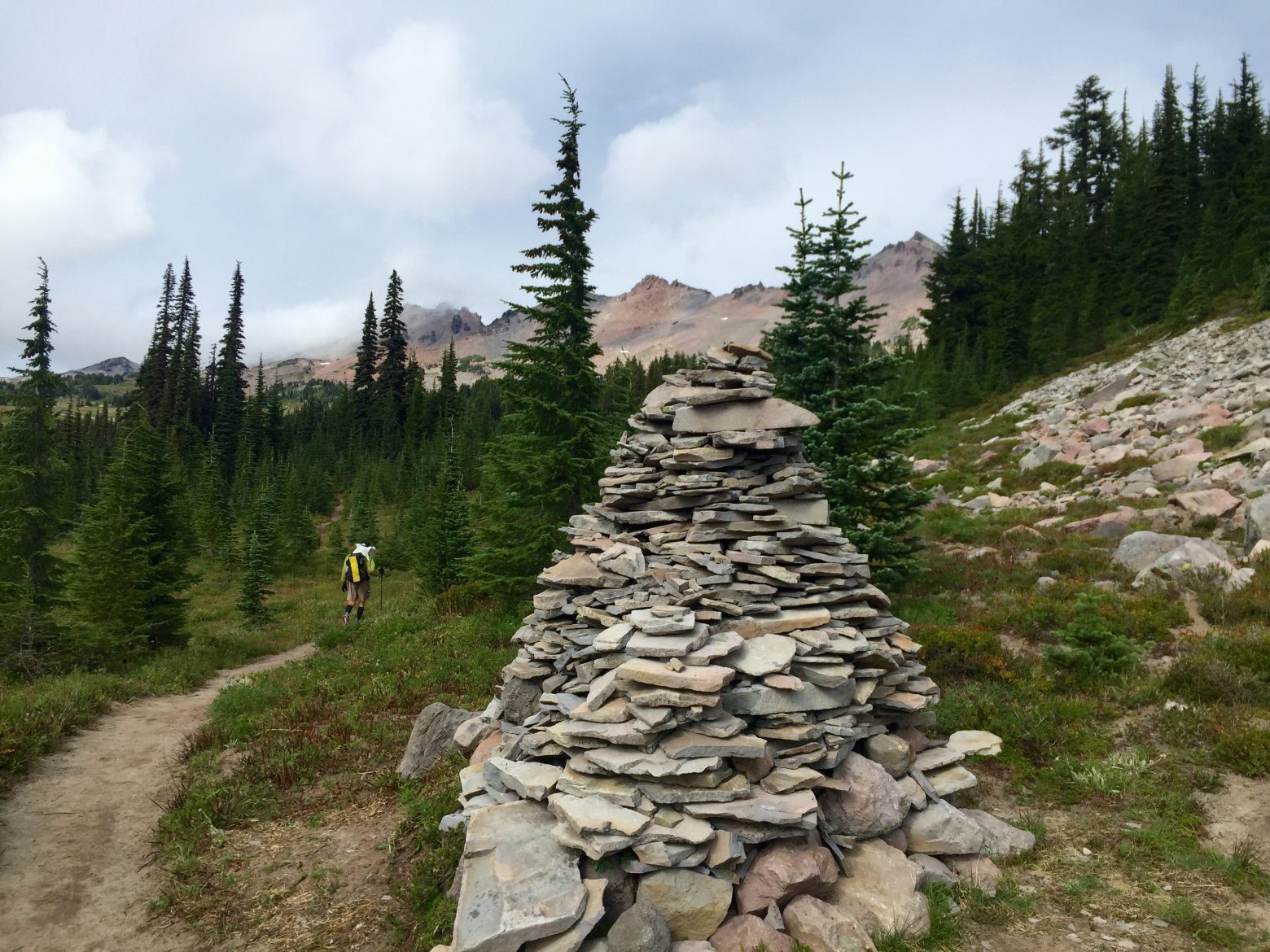 Giant rock cairn next to the Pacific Crest Trail in Goat Rocks Wilderness
