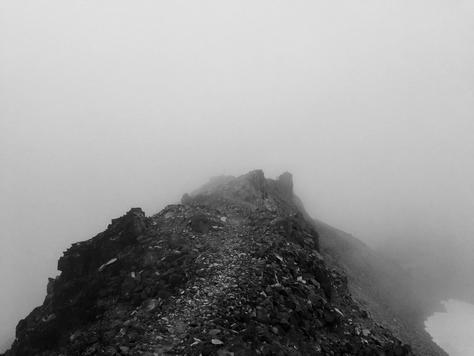 Rocky trail through the clouds on the Knifes Edge