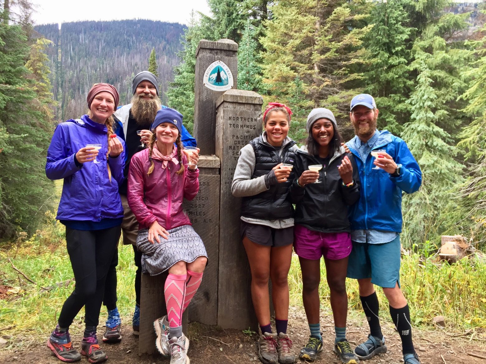 A champagne toast at the PCT Northern Terminus