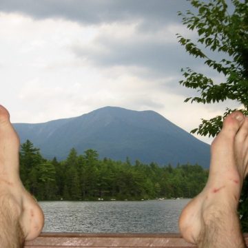 Mountain Man feet framing Mt. Katahdin From Daicey Pond