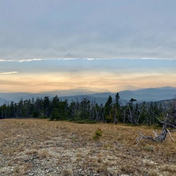 Smoky sunset beneath a retreating cloud front
