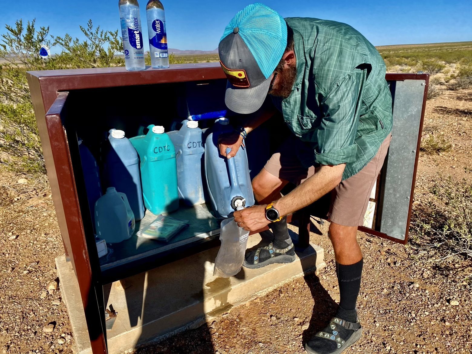 Stocking up at a water cache