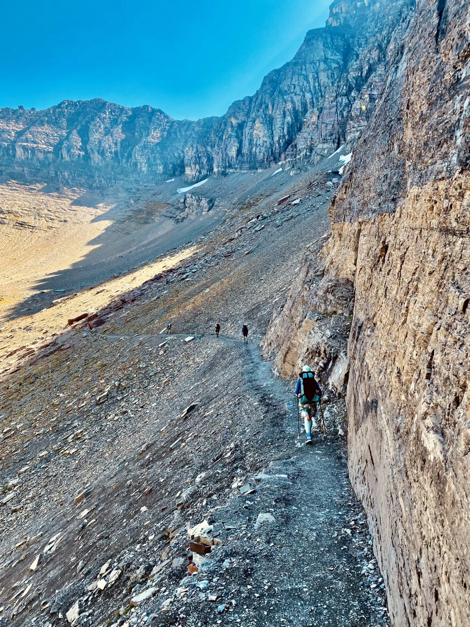 Trail clinging to a wall beneath Iceberg Peak