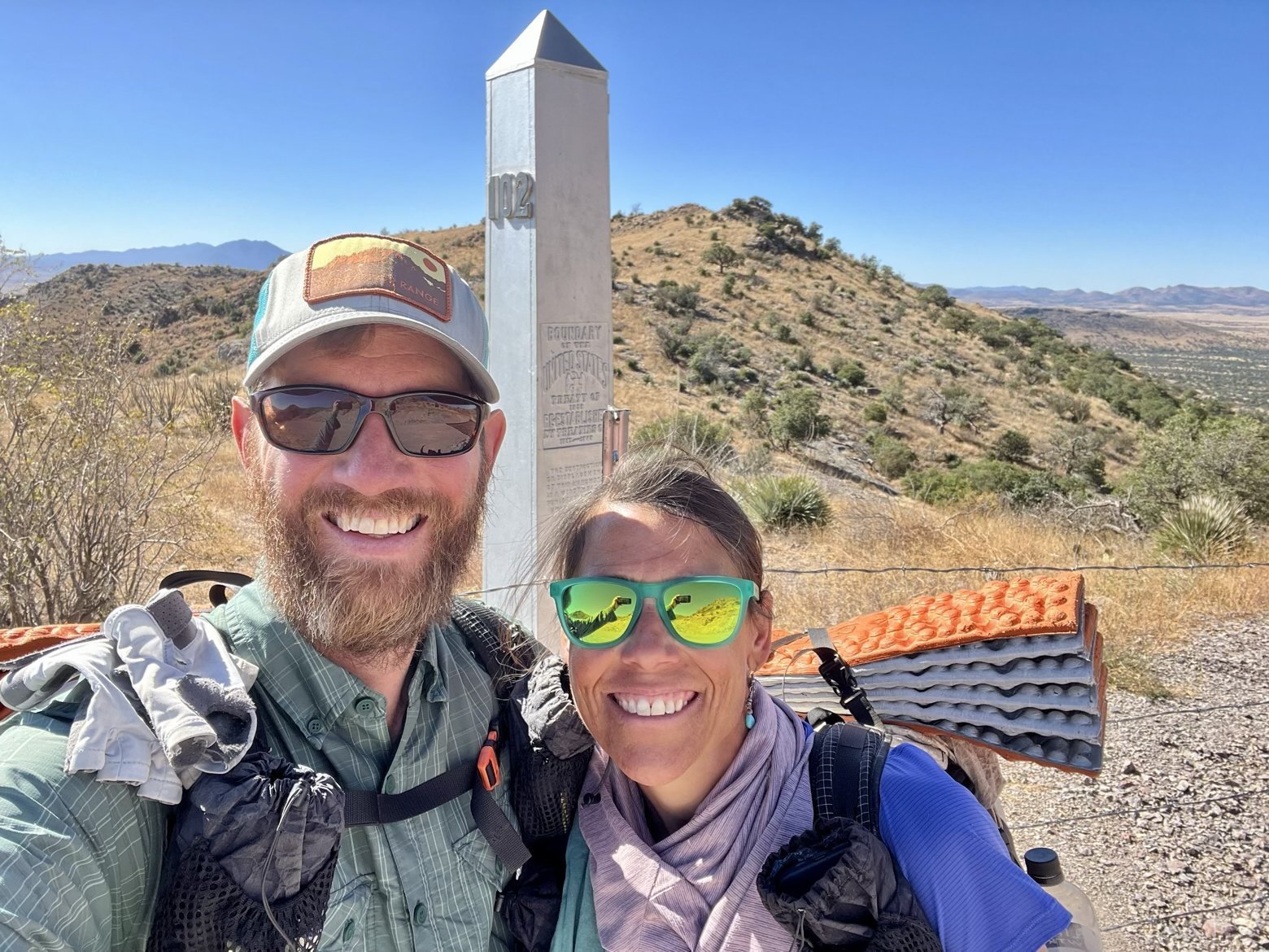 Mountain Man and Ace at the AZT southern terminus obelisk