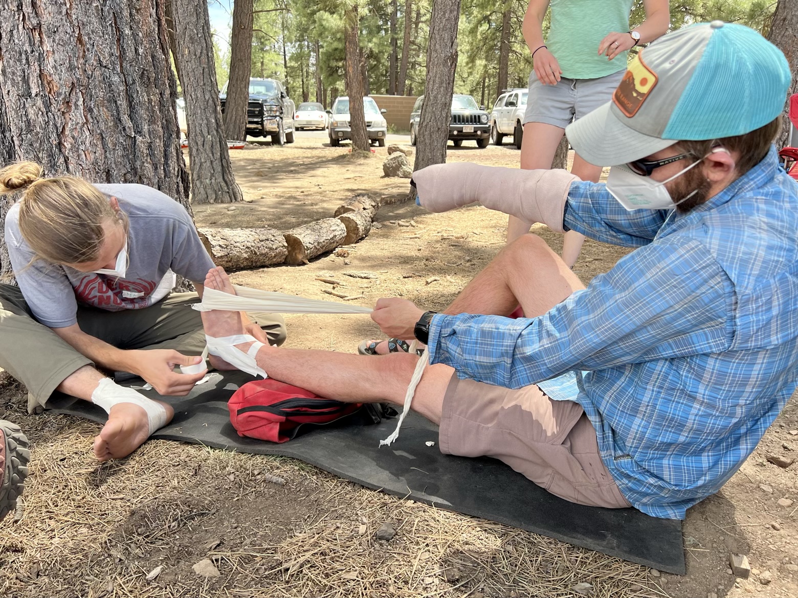 Taping ankles and splinting wrists at a hybrid Wilderness First Responder course