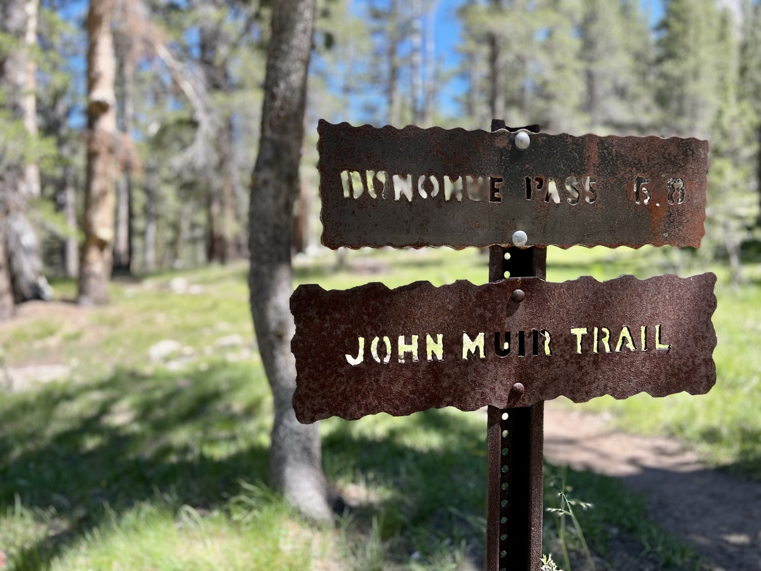 Rusted stencil JMT sign