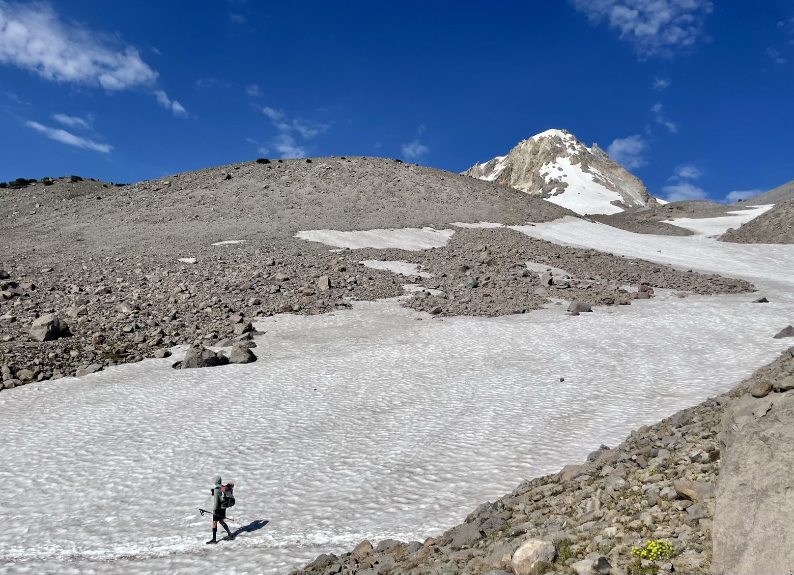 Snowfield traverse under the watchful eye of Mount Hood